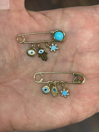 18K-Gold-Baby-Safety-Pins-Meaningful-Protective.-ojo turco,hamza, estrella de david , alfiler de bebe en oro