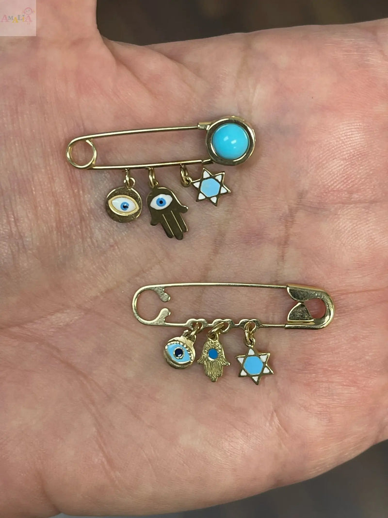 18K-Gold-Baby-Safety-Pins-Meaningful-Protective.-ojo turco,hamza, estrella de david , alfiler de bebe en oro