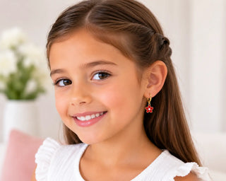 18K Solid Yellow Gold Red Enamel Flower Lever Back Earrings on a girl