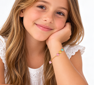 18K Solid Yellow Gold Multicolor Enamel Hearts Bracelet on a girl 